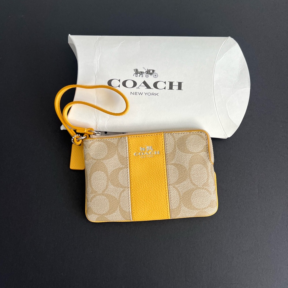 Coach Tan and Yellow Wristlet NWT “C”’s